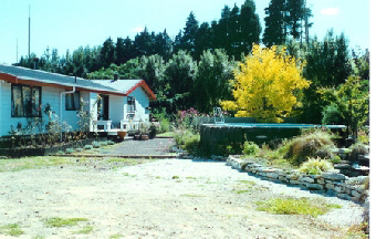 House, pool and back yard. Breakfast bar through ranch slider doors from deck.