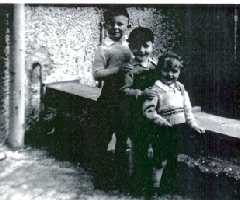 Tia’s boys. I’m the one in the middle, in my school cap and jersey. The boxing is around a pipe that fed hot mineral water into a very large bathing tub. It was closed later due to fears about poisonous gas.