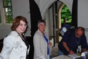 Barbara Tearle, Richard Tearle and Jennie Pugh with the registry book
