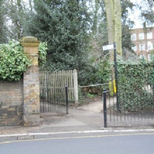 Entrance to the Hillcrest Estate in Southwood Lane. Park House Passage is on the left and leads to North Hill and the Wrestlers Public House.