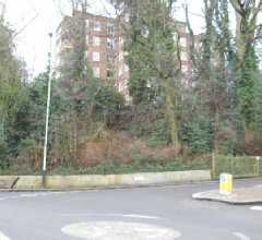 “The Bulwarks” from the junction of Park Road and Southwood Lane. The visible block of flats is the rear of Wavell House.