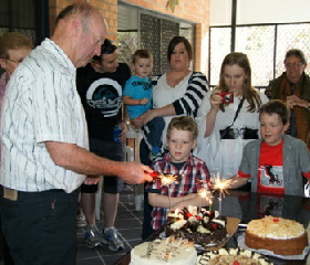 Sparklers on the cake - Doug, Ethan and Corey, James & Liz, Helen, Honorah.