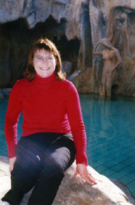 Elaine sitting by the hotel pool