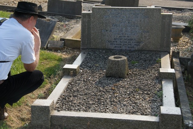 615 H-CON Ewart studies the grave of Alfred, Florence Mary Tearle and Annie nee Hodges. Vicarage Rd Cemetery Watford.